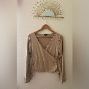 Ambiance, size Large, long sleeve shirt, V neck, sides ties can be adjusted,